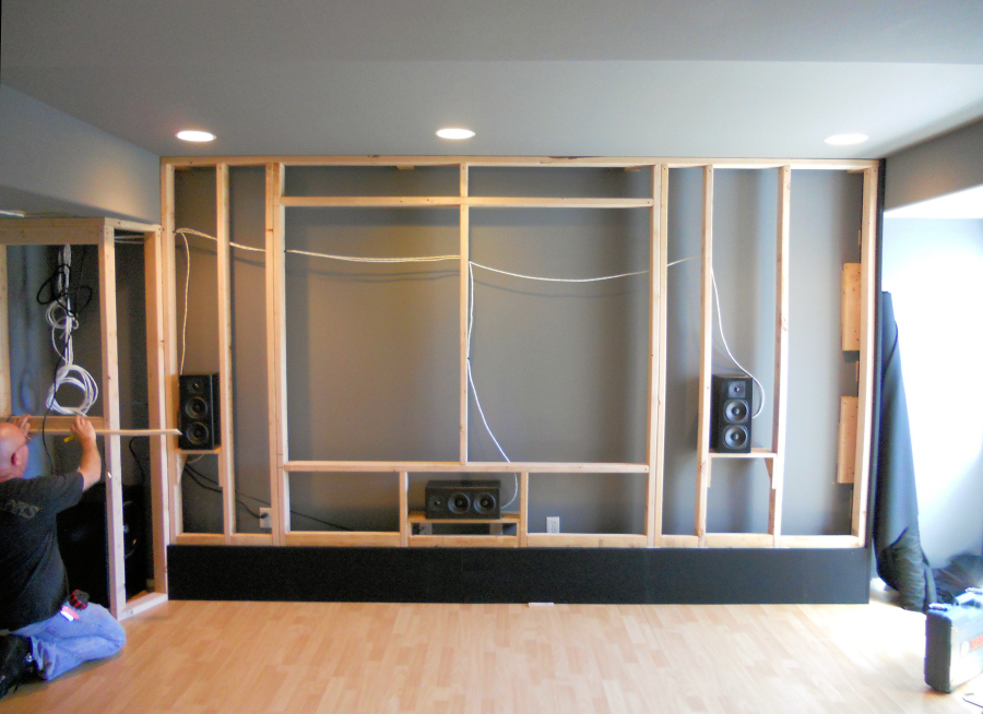 A custom acoustically designed screen wall by Theater Design Northwest in Seattle